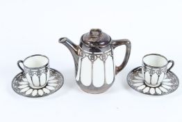 A ROSENTHAL SILVER OVERLAY DEMI-TASSE TEA SET.