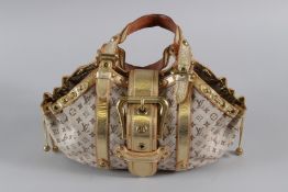 A LOUIS VUITTON FABRIC AND GOLD STRAP 2004 BAG. 34cms long. Sold with POIZON Authentication