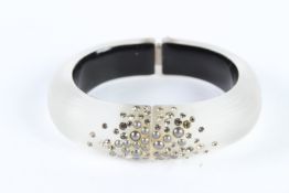ALEXIS BITTAR, A SIGNED DECO TYPE BANGLE.