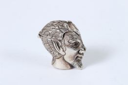 A SILVER DEVIL'S HEAD VESTA CASE.