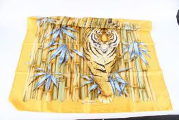 A SALVATORE FERRAGAMO BAMBOO SILK SCARF in original box.
