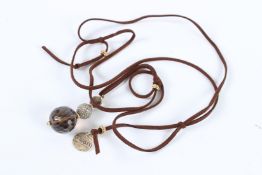 A BROOSKI BEAD AND ROPE NECKLACE.