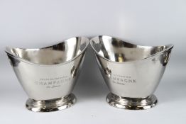 A GOOD PAIR OF CHROME TWO-HANDLED OVAL CHAMPAGNE COOLERS. 25cms x 32cms.