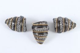 A PAIR OF HEAVY SILVER DIAMANTE EARRINGS AND A RING.