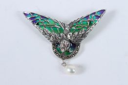 A SILVER ENAMEL AND PEARL SWALLOW BIRD BROOCH.