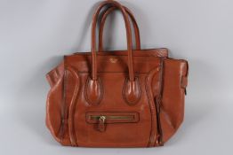 A CELINE OF PARIS LEATHER BAG. 40cms high.