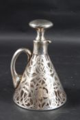 A TAPERING SILVER OVERLAY DECANTER AND STOPPER. 8ins high, a Golf Trophy.