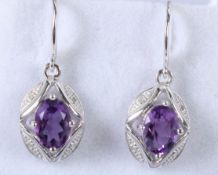 A PAIR OF SILVER AMETHYST AND DIAMOND DROP EARRINGS.