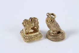 TWO OWL AND LION SEALS.