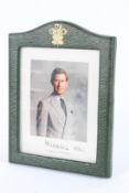 A PHOTOGRAPH OF PRINCE CHARLES 1992. Signed, in a leather frame. Photo 12cms x 10cms.