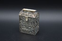 A SMALL FILIGREE SILVER BOX. 2.5ins high.