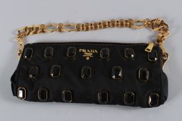 A PRADA BLACK BAG set with stones, with gilt metal strap. No. BR3116 VITELLO DAINO NERO. 34cms