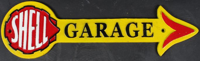 A SHELL CAST IRON GARAGE ARROW. 42cms long.