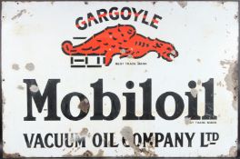 A LARGE VINTAGE GARGOYLE MOBILOIL ENAMEL SIGN with the Gargoyle emblem. 76cms x 115cms.