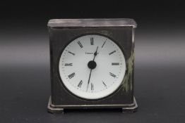 A TIFFANY & CO CLOCK, 3ins high. in a Tiffany & Co box.