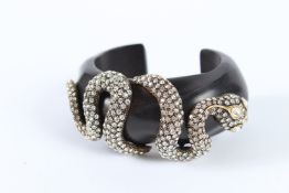 A SNAKE DIAMANTE BLACK BANGLE. 8cms.