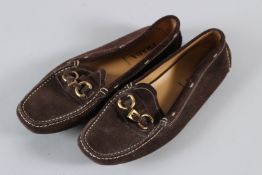 A PAIR OF PRADA SUEDE SHOES. Size 38, with dust bag.