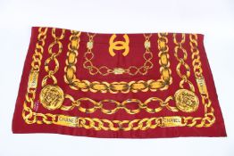 A CHANEL GOLD CHAIN SILK SCARF. 160cms x 100cms.