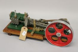 A MODEL OF A REVERSING MILL ENGINE, Stevensons link reverser. 19cms x 50cms.