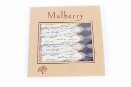 A MULBERRY SILK SCARF in original wrapper.