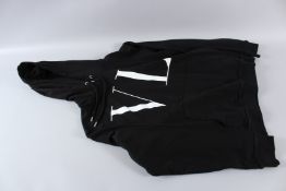 A LARGE VI SWEATSHIRT with hood.