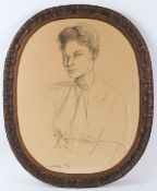 JEAN THEOBOLD JACUS Bust portrait of a society lady charcoal signed and dated '54 oval 67 x 53cm