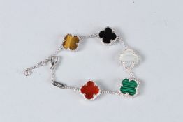A SILVER CLOVER LEAF BRACELET