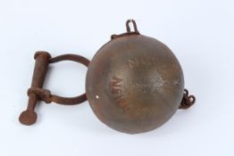 A REPRODUCTION BALL AND CHAIN.