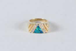 A 14CT GOLD, OPAL AND DIAMOND MEN'S RING