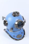 A REPRODUCTION DIVERS HELMET.