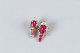 AN 18CT GOLD, DIAMOND AND RUBY BIRD BROOCH