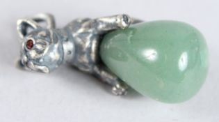 A SILVER AND JADE DOG EGG PENDANT