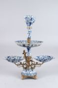 A BLUE AND WHITE PORCELAIN THREE-TIER AND GILT METAL EPERGNE