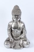 A SILVERED COMPOSITE MODEL OF A SEATED BUDDHA.