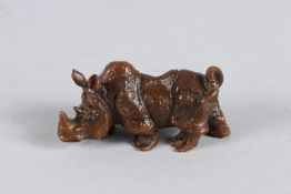 A SMALL JAPANESE BRONZE RHINO. 7cm