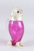 A LARGE CRANBERRY GLASS AND PLATE OWL CLARET JUG. 11ins high