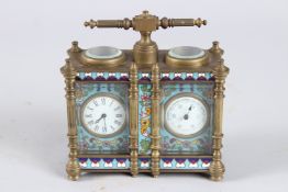 A FRENCH BRASS AND CLOISONNE ENAMEL DOUBLE CARRIAGE CLOCK with carrying handle. 4.75ins wide
