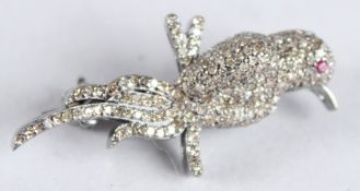 A DIAMOND PARROT BROOCH