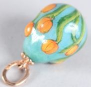 A RUSSIAN 14CT GOLD, LILY EGG PENDANT.