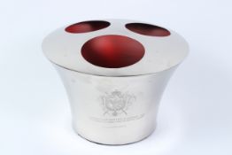 A POLISHED METAL THREE BOTTLE WINE COOLER.