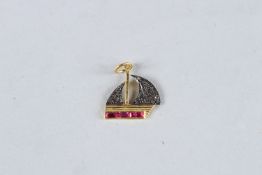 A DIAMOND SET BOAT PENDANT