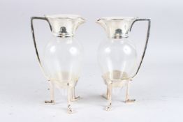 A PAIR OF CHRISTOPHER DRESSER DESIGN CROW FOOT JUGS