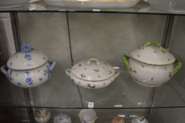 Three large Herend twin handled dishes and covers.