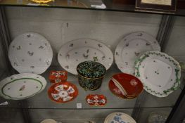 A collection of Herend porcelain to include parrot decorated dishes etc.