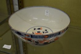 Three 19th century Imari decorated bowls, all chipped and or cracked.