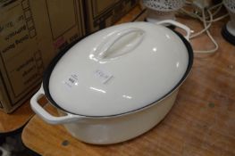 Cast iron casserole dish and cover.