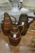 Three brass bound jugs.