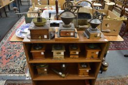 A collection of old coffee grinders.