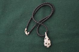 A diamante pendant.