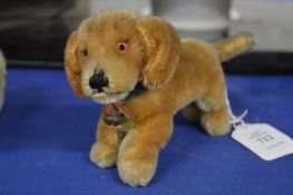 A small Steiff dog 'Bazi'.